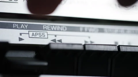 4K Close up of Play button being pressed on a retro stereo cassette player Stock Footage 56568317