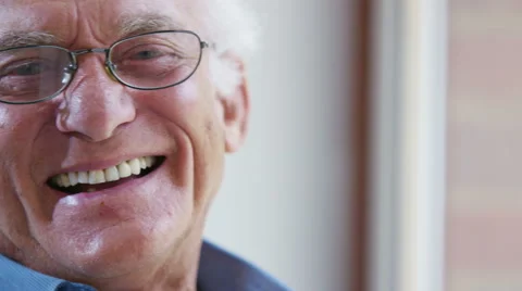 4K Close up portrait of elderly man laughing Stock Footage 56602783