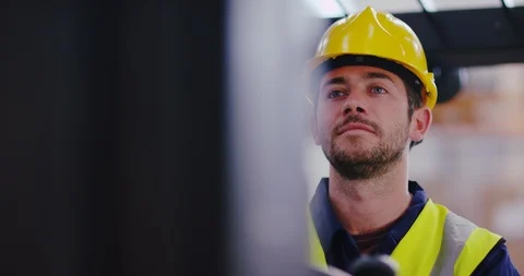 4K Close up portrait of smiling warehouse worker operating a forklift loader. Stock Footage 102060693