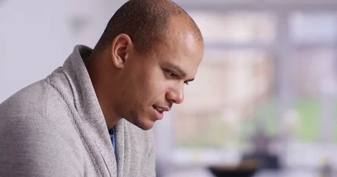 4K Close up portrait young mixed race man using tablet computer with keyboard Stock Footage 71903788