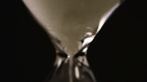 4K Close up of a sand timer as the sand falls  Video stock 71254821