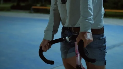 4k Close up shot of a cyclist standing on the bicycle handle bar Video stock 103061517