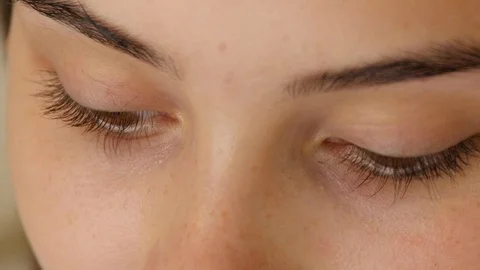 4K close up shot of female blinking eyes. Stock-Footage 102496717