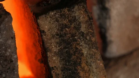 4K close-up shot that A flame and smoke is coming out of a porcelain kiln brick. Stock Footage 76539296