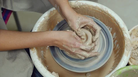 4k Close up shot of forming the hole in the clay Stock-Footage 102465178