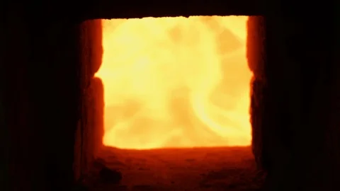 4K Close -up shot that A hot flame is burning in a porcelain kiln. Stock Footage 76486168