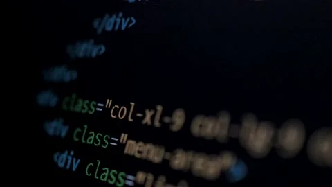 4K Close-up shot HTML tag code on PC Monitor scroll down. Background Stock Footage 219465326