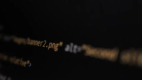 4K Close-up shot HTML tag code on PC Monitor scroll down. Background Stock Footage 219465356