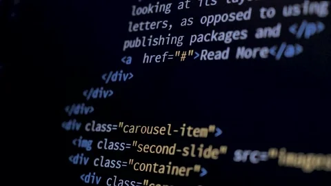 4K Close-up shot HTML tag code on PC Monitor scroll down. Background Stock Footage 219465375