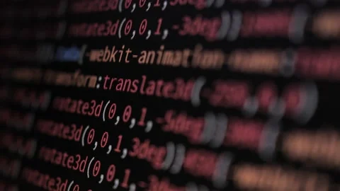 4K Close-up shot programming tag code on PC Monitor scroll down. Stock Footage 219465317