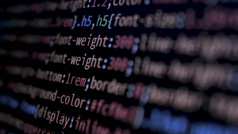 4K Close-up shot programming tag code on PC Monitor scroll down. Stock Footage 219465343