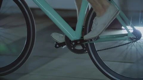 4K Close up shot of the wheels and treadle of riding bike with the cyclist Stock-Footage 102564467