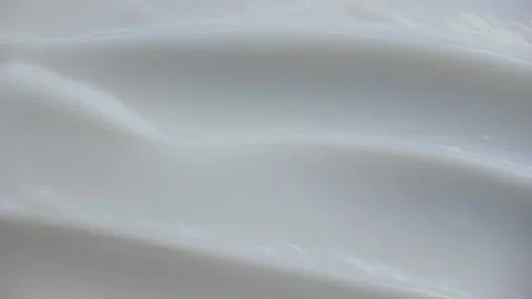 4K Close-up of Silky White Cream Texture Swirling Stock Footage 340851179