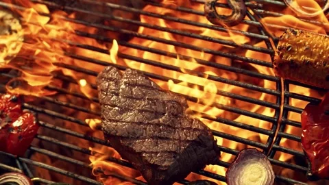 4K Close-up Steak and Vegetables Cooking on Hot Grill Over Open Flame Stock Footage 330480942