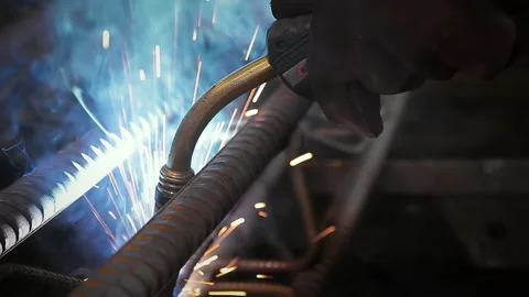 4K close up of Steel Worker Welding Metal Construction Stock Footage 234247096