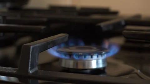 4k close up on a stoves hob rack/pull focus Video stock 47100464