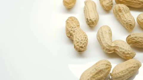 4k, Close-up studio shot footage of peanuts rotates in right side Stock Footage 82632483