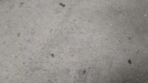 4K Close-up Textured Grey Concrete Surface Grainy Speckles Gradient Stock-Footage 330480935