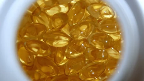 4k close-up top view footage transparent jelly tablets rotate clockwise Stock Footage 242235963