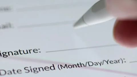 4K close-up of a touchscreen pen crafting a flowing digital signature starting w Stock Footage 342778028