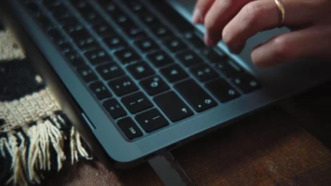 4K close-up video of an anonymous woman's hands pressing the Esc key on a laptop Stock Footage 346713608