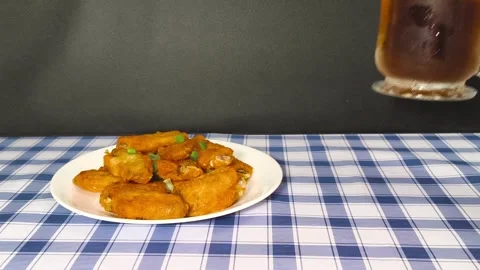 4k Close up view. Picking up cola beer glass drink beverage with ice cubes .. Video stock 318133707