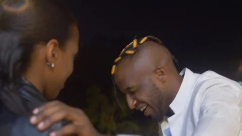 4K close up view of a smiling couple chatting enjoying coffee outside the coffee Stockbeeldmateriaal 111334801