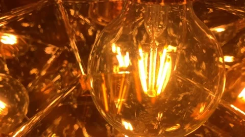 4k Close-up Of Warm Light Bulb Energy, Electricity, Innovation Concept. Stock Footage 135849751
