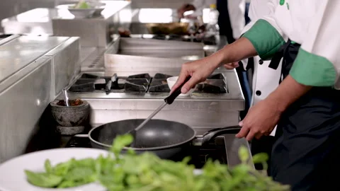4K closeup hands working in kitchen, chef chopping vegetables tomatoes on t.. Stock-Footage 245140304