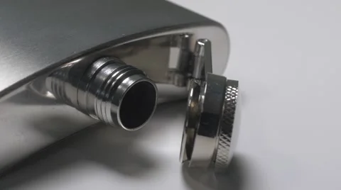 4K Closeup of an Open Alcohol Flask Stock Footage 61567739
