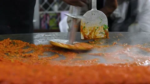 4K Closeup shot of a chef making famous Indian fast food dish called Pav Bhaji Stock Footage 166892445