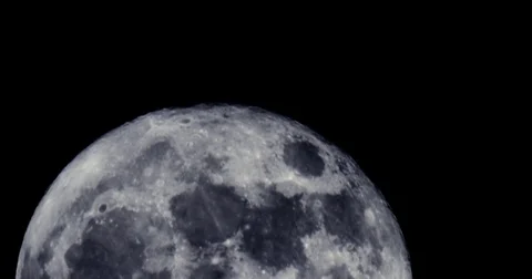 4k closeup shot of super moon rising through the frame. Stock Footage 69831949