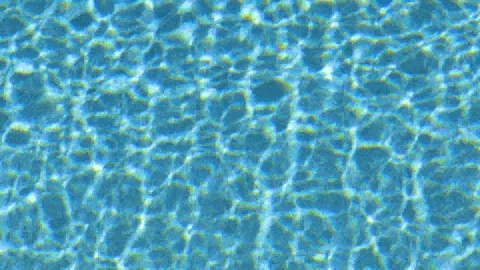 4K Closeup of Sparkling Blue Pool Water Stock Footage 111031973