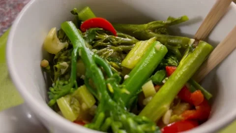 4K closeup stiring single serving microwave organic vegetables Stock Footage 224202703