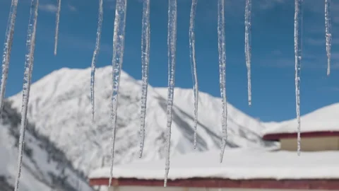 4K closeup video of Icicles Melting  in remote Himalayan region of Pakistan Stock Footage 330623341