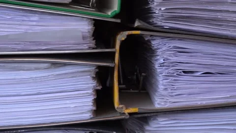 4K closeup video of papers and files in archives of business financial documents Stockbeeldmateriaal 141420053