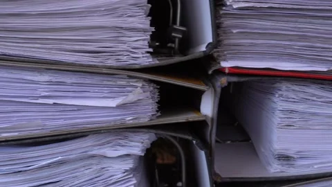 4K closeup video of papers and files in archives of business financial documents Stock Footage 143452892