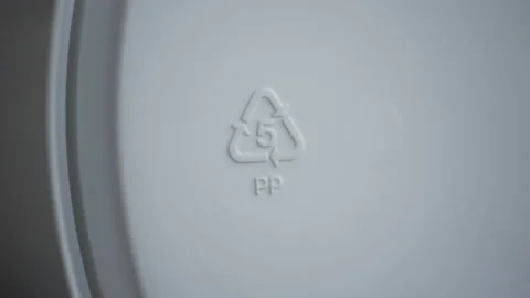 4k Closeup view of 5 pp recycling sign or label on white packaging spbd. Stock Footage 195091463