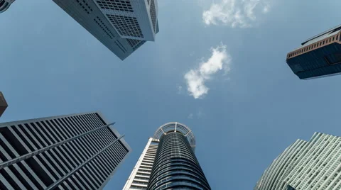 4K cloud timelapse against tall skyscrapers in Raffles place Stock Footage 49513722