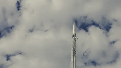 4K Cloud timelapse with chromed rocket Stock Footage 267603593