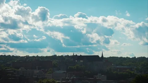 4k - Cloud timelapse with city right under Stock Footage 52880202