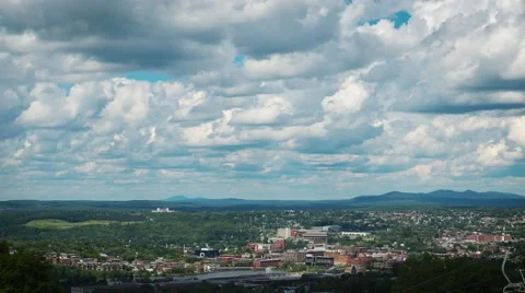 4k - Cloud timelapse with city right under Video stock 52942852