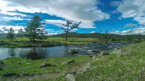 4K. Clouds above the Ulaan river, Mongolia. Ultra HD, 3840x2160 Stock Footage 106969544