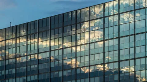 4K Clouds on glass Facade - modern architecture in Hamburg Timelapse Stock Footage