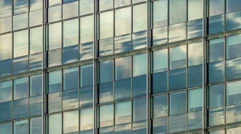 4K Clouds on glass Facade - zoom out - DSLR timelapse Video stock 42917166
