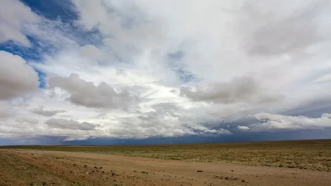 4K. Clouds over the Gobi Desert, Mongolia. Ultra HD, 4096x2304 Stock Footage 73917676
