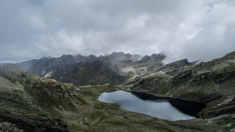 4k Clouds over mountain lake ZoomOut Timelapse Stock-Footage 87280667