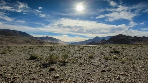 4K. Clouds over the valley of the river Khovd, Mongolian Altai, Mongolia. U.. Video stock 73979871