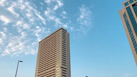 4k Clouds timelapse with building skyscraper, blue sky, Pro res 422 HQ Stock Footage 286216607