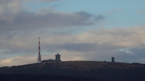 4k Clouds timelapse close up of Brocken peak with buildings mountain range Harz Stock Footage